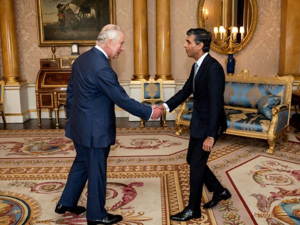King Charles III welcomes Rishi Sunak during an audience at Buckingham Palace, London, wher<em></em>e he invited the newly elected leader of the Co<em></em>nservative Party to become Prime Minister and form a new government on Tuesday October 25, 2022.